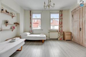Posteľ alebo postele v izbe v ubytovaní MS Apartments SopotForSix