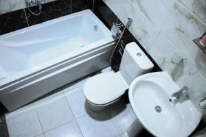 Phòng tắm tại Kmt Hostel