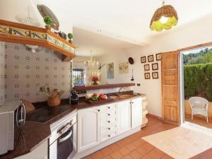 A kitchen or kitchenette at Rustic House in Mancor with Pool