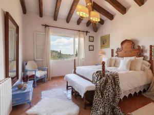 A bed or beds in a room at Rustic House in Mancor with Pool