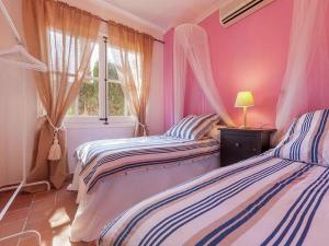 A bed or beds in a room at Rustic House in Mancor with Pool