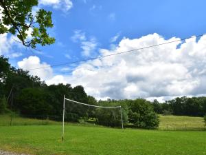 a soccer net in a field with a sky at Lovely holiday home in stunning location private pool and 6 mountain bikes in Théminettes