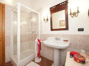 A bathroom at Holiday Home in Vezzi Portio with Pool