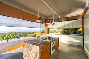 Kuchyň nebo kuchyňský kout v ubytování The Arancia Villa