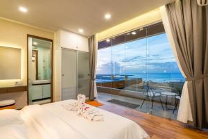 Postel nebo postele na pokoji v ubytování The Arancia Villa + 51 fotografií