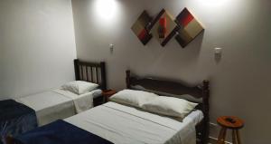Ein Bett oder Betten in einem Zimmer der Unterkunft Cantinho da Vovó