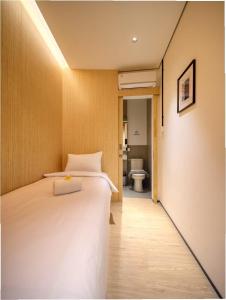 Tempat tidur dalam kamar di Cool Living