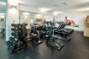 a room filled with lots of different types of equipment at Novotel Melbourne On Collins in Melbourne