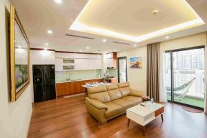 Khu vực ghế ngồi tại *BOM HOMES* IMPERIA GARDEN RESIDENCE APARTMENT