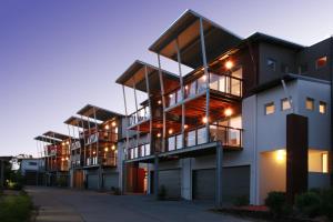 a large building with a lot of windows at Quarterdecks Retreat in Hervey Bay