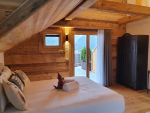 Postel nebo postele na pokoji v ubytování Le Vieux Chalet