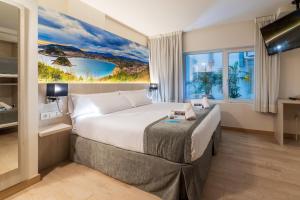 Postel nebo postele na pokoji v ubytování Atotxa Rooms
