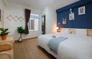 Postelja oz. postelje v sobi nastanitve Moc Thach Hostel Dalat
