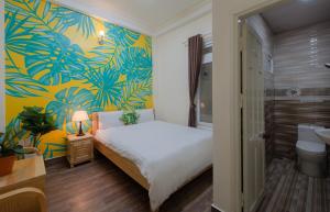 Postelja oz. postelje v sobi nastanitve Moc Thach Hostel Dalat