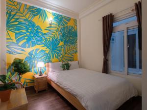 Postelja oz. postelje v sobi nastanitve Moc Thach Hostel Dalat