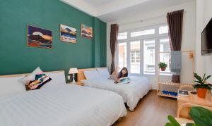 Postelja oz. postelje v sobi nastanitve Moc Thach Hostel Dalat