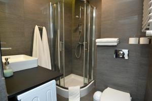 Koupelna v ubytování Apartamenty TOP Garbary