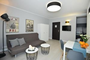 TV a/nebo společenská místnost v ubytování Apartamenty TOP Garbary