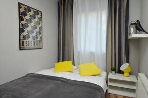 Postel nebo postele na pokoji v ubytování Apartamenty TOP Garbary