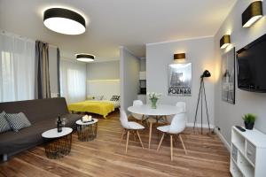 TV a/nebo společenská místnost v ubytování Apartamenty TOP Garbary