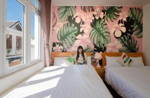 Postelja oz. postelje v sobi nastanitve Moc Thach Hostel Dalat
