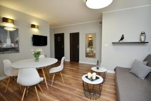 TV a/nebo společenská místnost v ubytování Apartamenty TOP Garbary