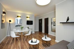 TV a/nebo společenská místnost v ubytování Apartamenty TOP Garbary
