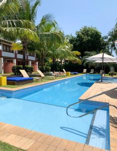 Bazén v ubytování Casa Reserva Praia do Forte 2 quartos Conforto e Charme nebo v jeho okolí