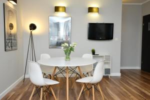 TV a/nebo společenská místnost v ubytování Apartamenty TOP Garbary