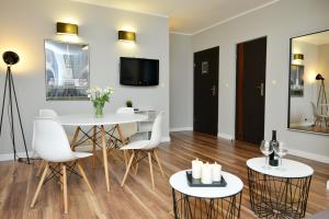 TV a/nebo společenská místnost v ubytování Apartamenty TOP Garbary