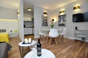 TV a/nebo společenská místnost v ubytování Apartamenty TOP Garbary