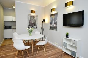 TV a/nebo společenská místnost v ubytování Apartamenty TOP Garbary