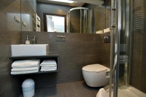 Koupelna v ubytování Apartamenty TOP Garbary