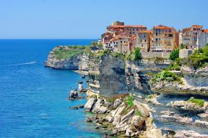 a group of buildings on top of a cliff at L'Appart in Bonifacio
