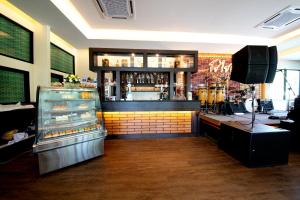 Lounge nebo bar v ubytování Rnana Grand