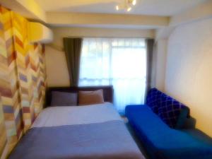 Кровать или кровати в номере Dazaifu - Apartment / Vacation STAY 36947