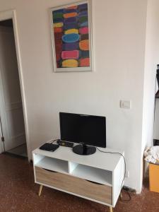 TV a/nebo společenská místnost v ubytování Apartamentos Beatriz
