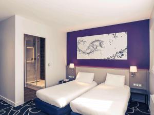 Postel nebo postele na pokoji v ubytování Mercure Saint Lô Centre