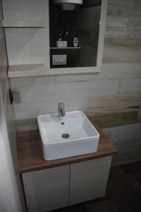 Bilik mandi di Apartman G1 u Milmari kompleksu - Kopaonik +38 gambar