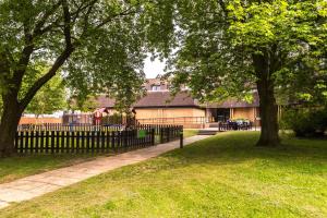 A garden outside Holiday Inn Lancaster, an IHG Hotel 
