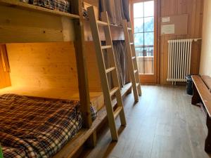 Postel nebo postele na pokoji v ubytování Freeride Hostel