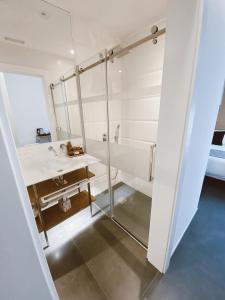 Cama o camas de una habitación en Salamanca Suites Libertad