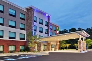 a rendering of a hotel building at Holiday Inn Express & Suites - Fayetteville by IHG in Fayetteville