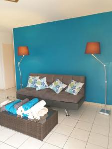 منطقة جلوس في Rose phoenix appartement terrasse et piscine vue mer