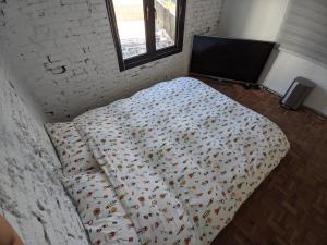 Postel nebo postele na pokoji v ubytování Qianmo - Cheng Tung Homestay