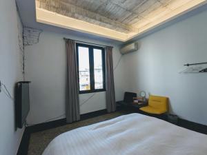 Postel nebo postele na pokoji v ubytování Qianmo - Cheng Tung Homestay