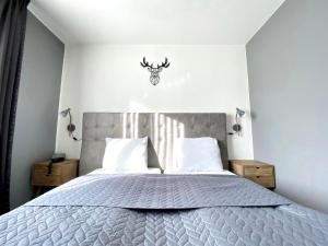 Postel nebo postele na pokoji v ubytování Hotel De Fierlant