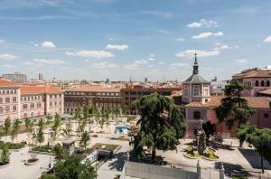 a view of the city from the roof of a building at El Tribunal de Barceló in Madrid
