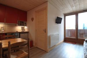 Kuchyň nebo kuchyňský kout v ubytování Bel appartement 25m2 exposé plein sud