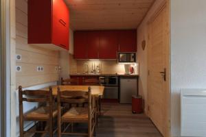 Kuchyň nebo kuchyňský kout v ubytování Bel appartement 25m2 exposé plein sud